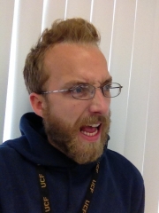 History teacher Craig Johnson makes a face for a post-class selfie. 