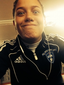 Sophomore Leean Shrikiy poses for a pre-game selfie before taking the pitch for the JV soccer season kickoff.