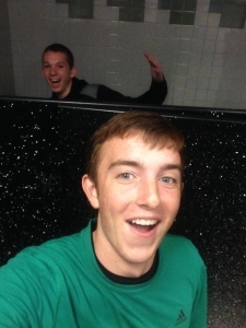 Sophomores Nathaniel Kauffman and Ben Clyatt goof around in the bathroom and capture the moment with an over-the-stall-wall selfie