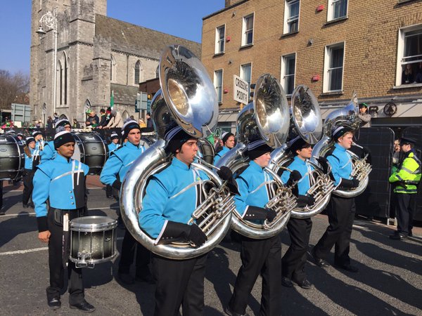 Students stomp through Dublin, Ireland during the St. Patrick's Day Parade, the kick-off event of the four-day festival. Marching band traveled to perform in the international celebration the day before the parade. 