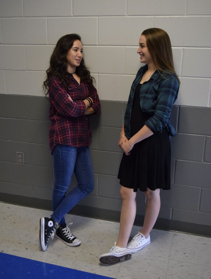 As+seniors+Sarah+Halverson+and+Julia+Dansereau+flaunt+their+flannel+shirts+and+chokers%2C+some+teachers+have+noticed+that+more+and+more+students+are++wearing+these+trends+and+are+forced+to+consider+the+possibility+that+maybe+the+90s+never+left+at+all.+