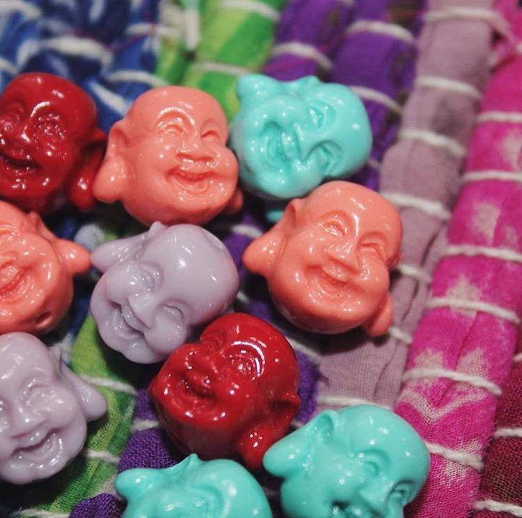 Buddha charms were added to Marcums bracelets to bring more color and happiness to each one.
