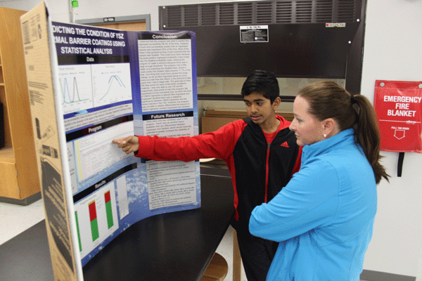 Neel Maity practices his presentation before the science fair. Five students from experimental science competed at the annual science fair. 