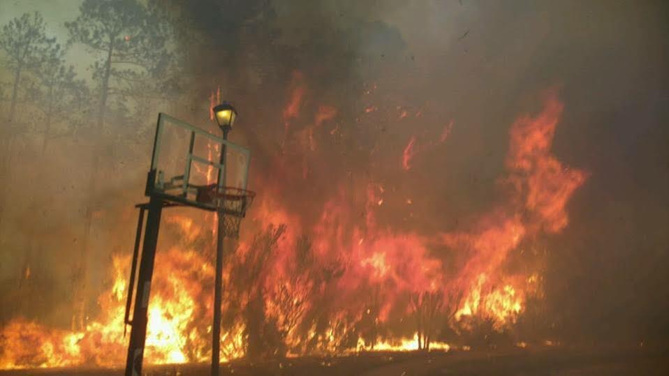 The Sterling Creek blaze encroaches on residential territory.