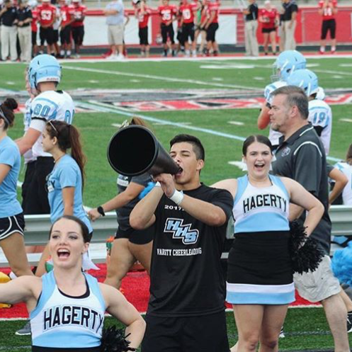 Junior Bryan Fajardo cheers on the huskies during the spring football game against Lake Mary on May 19. The team fell to the rams 56-21.