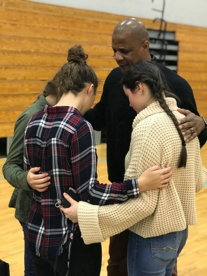 Darryl Strawberry and club members pray after the ceremony. Members who attended got to listen to Strawberrys presentation as well as has individual time with him.  