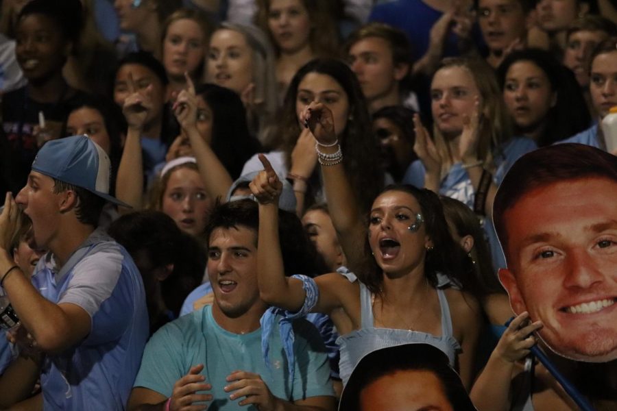 The Hagerty student section celebrates as their team scores their first points of the game.