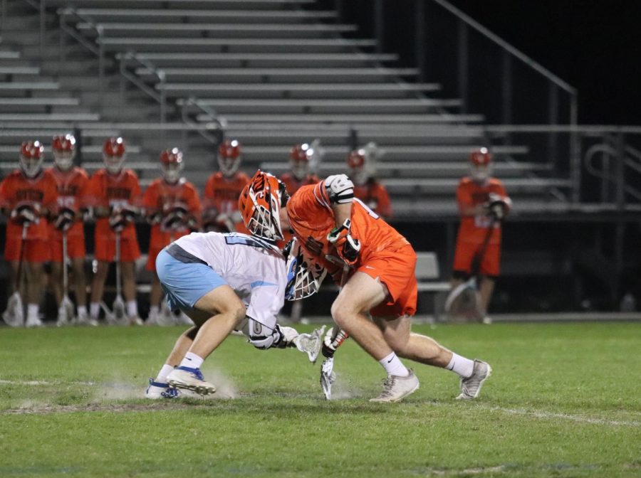 Senior Christian Hofer faces off against Oviedo player at the game on March 5, 2020. Hagerty loss the game 6-8.