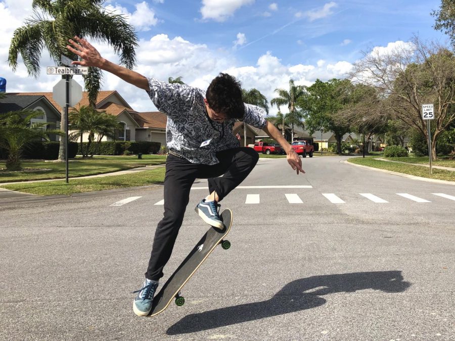 Junior Jackson Schwerdt performs an ollie, a popular trick many skateboarders learn. He usually practiced a few times a week for a couple hours.