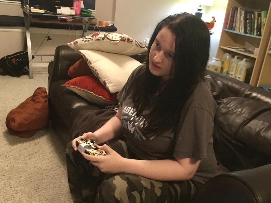 Junior Samantha Sutch plays Animal Crossing: New Horizons on her Nintendo Switch. She bought the game the day it was released, March 20.