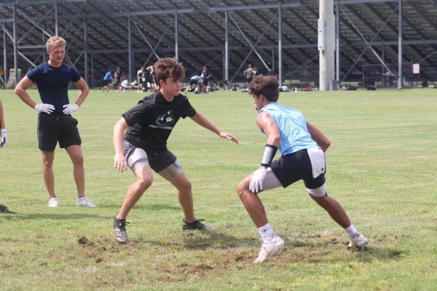 Safety Evan Kauffman and reciever Dylan Lujan go up against eachother in defensive drills during practice in preparation for the away game against Timber Creek. 