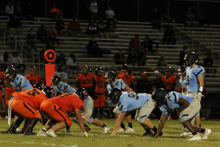 Varsity football faces off against Oviedo. They were tied most of the game, but lost 20-14.