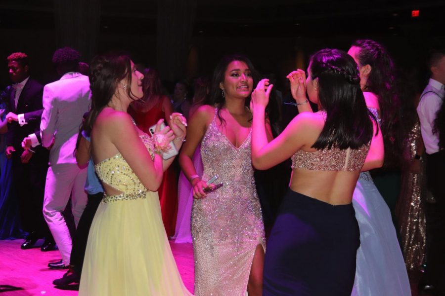 Seniors from the class of 2019 dance at prom together. They were the last senior class to enjoy a traditional prom before the coronavirus.