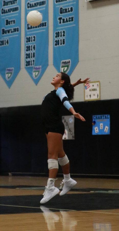 Sophomore Sabrina Valentin serves for the JV girls volleyball team who have a record of 8-3.