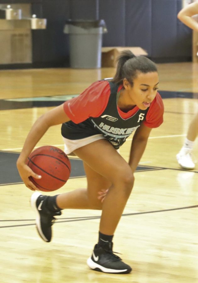 Guard Katherine Castro is dribbling the ball at practice during a drill. The girl’s varsity basketball team lost to Eustis 58-55, Thursday Nov. 18. 

