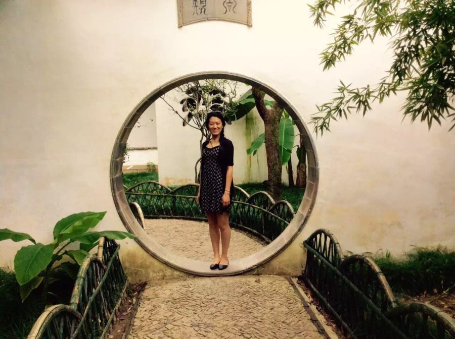 Chinese and math teacher Zhenzhen Zhang in one of the gardens in Suzhou in 2015. In her Chinese classes, Zhang often discusses her culture with her students, such as Chinese New Year traditions and ways birthdays are celebrated in China. 