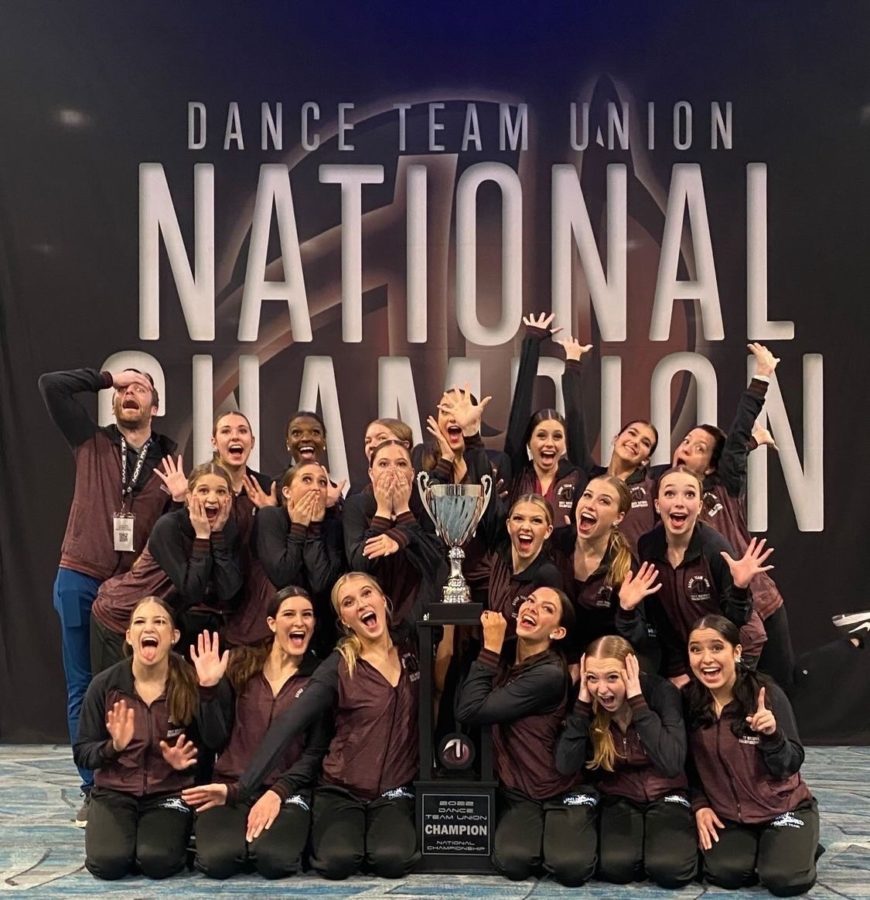 The varsity dance team celebrates their national victory on Feb. 20. This is the first time that they have taken a national title in the teams history.