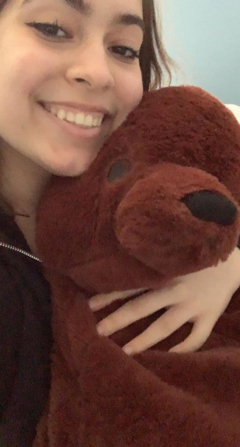 Junior Emmalys Caamaño holds her stuffed bear, Chungi. This bear was gifted to her by her long-distance boyfriend and reminds her that she is loved when they are apart.