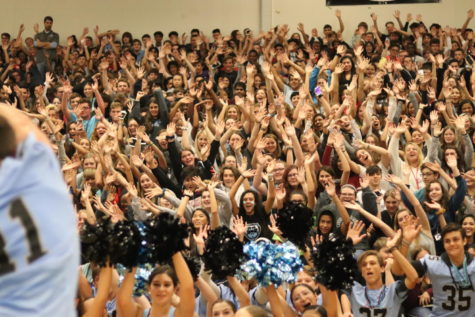 Students celebrating during an olympic themed indoor pep rally hosted in early 2020. This was one of the last indoor pep rallies for the past three years.