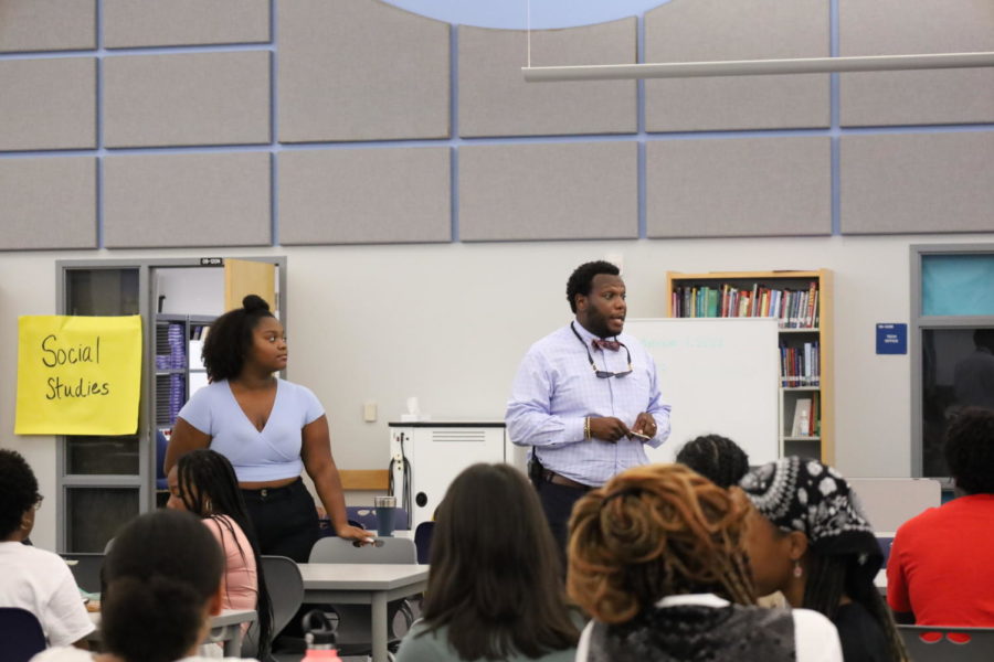 Assistant Principal Reginald Miller and BSU president Ciara Bibbs speak at the BSU meeting on Sept. 15. At the meeting, officer elections were held and Bibbs spoke about the upcoming HBCU Week. 