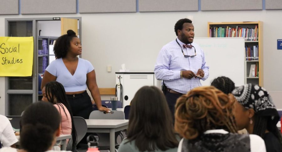 Assistant Principal Reginald Miller and BSU president Ciara Bibbs speak at the BSU meeting on Sept. 15. At the meeting, officer elections were held and Bibbs spoke about the upcoming HBCU Week. 