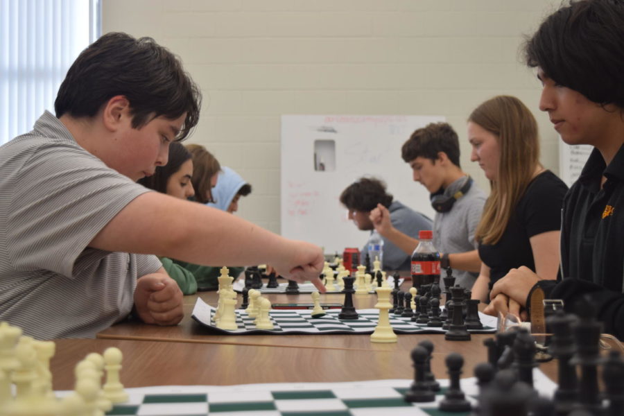 Freshman Gavin Mutchler makes a move during his second match of the tourney. The team fell short of winning it all but took second and third overall.