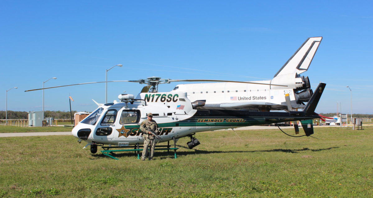 Chief Francis stands proudly in front of his helicopter. Francis joined the team as a medic and spent most of his days just flying around Florida.