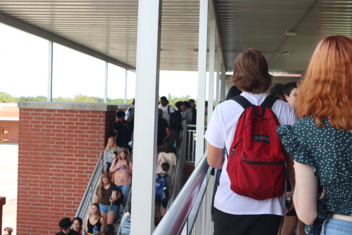 As kids are transitioning from class to class, the staircases and hallways are packed.