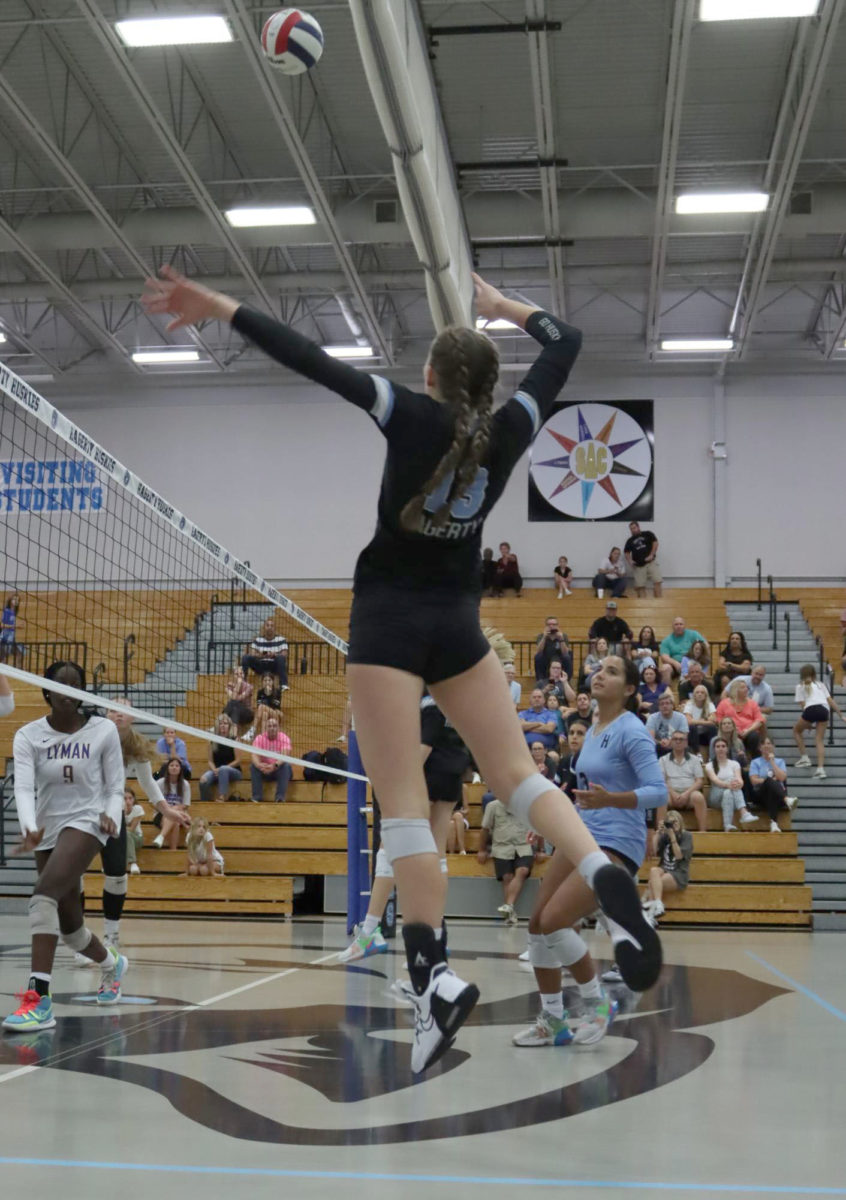 Outside hitter Jeness Orcutt goes for the kill. During the match against Lyman, Orcutt had five kills.