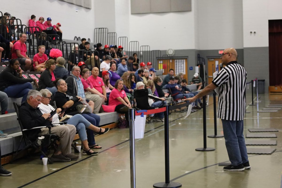 A referee talks during the drivers’ meeting, where he explains the rules of the game. The regulations were set by FTC leaders back in August. 