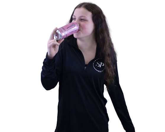 Sophomore Sarah McQuillin shows off her favorite energy drink, a strawberry Monster® Energy. This shows the growing popularity of teens using canned drinks to get their daily fix of energy.