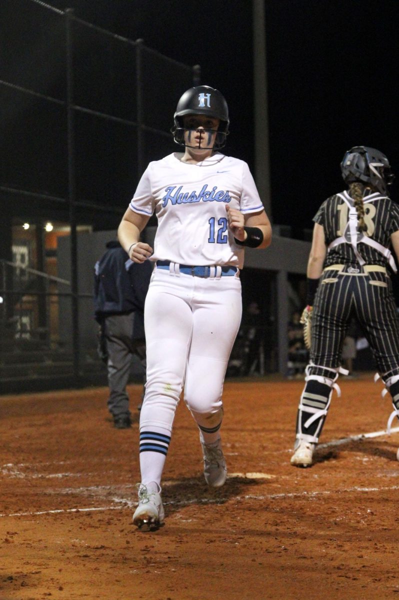 Sophomore Abi Fitch scores a run against Viera. This is Fitchs first year on varsity.