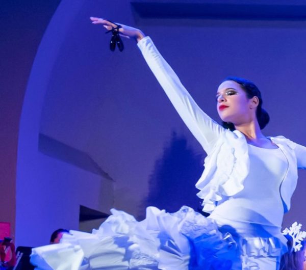 Junior Camila Bello dances stylized flamenco during a winter recital at Lake Eola. While Bello has experience dancing various styles of flamenco, her favorite style is bulerias.