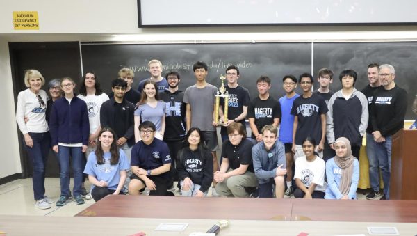 Students on the math team pose with their first place trophy at the end of competition. This year marked a record number of individual trophies as well, with four out of the six categories going to Hagerty students.