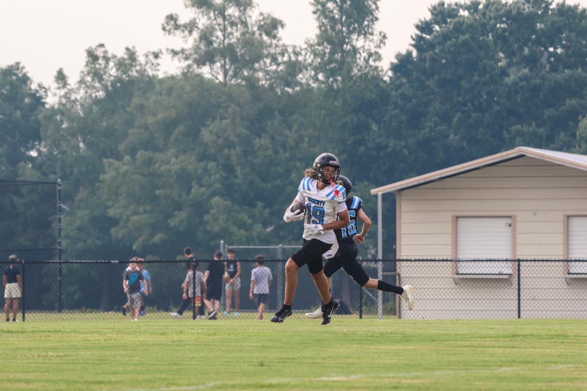 Senior Jalen Rivera runs with the ball. Varsity football's next game is against Oviedo on Oct. 4.