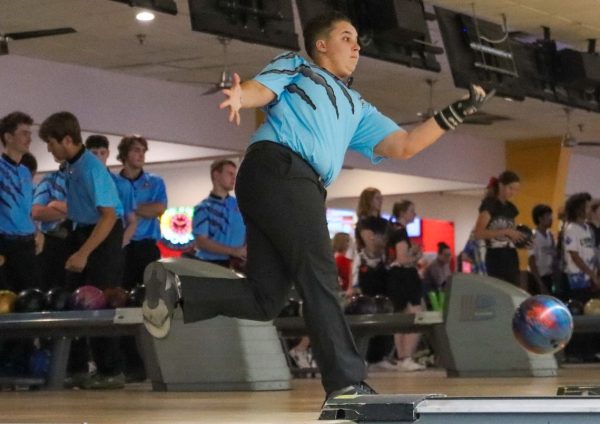 Senior Ashton Zitske bowls in a match last season, Zitske is the top performer for this years bowling team.