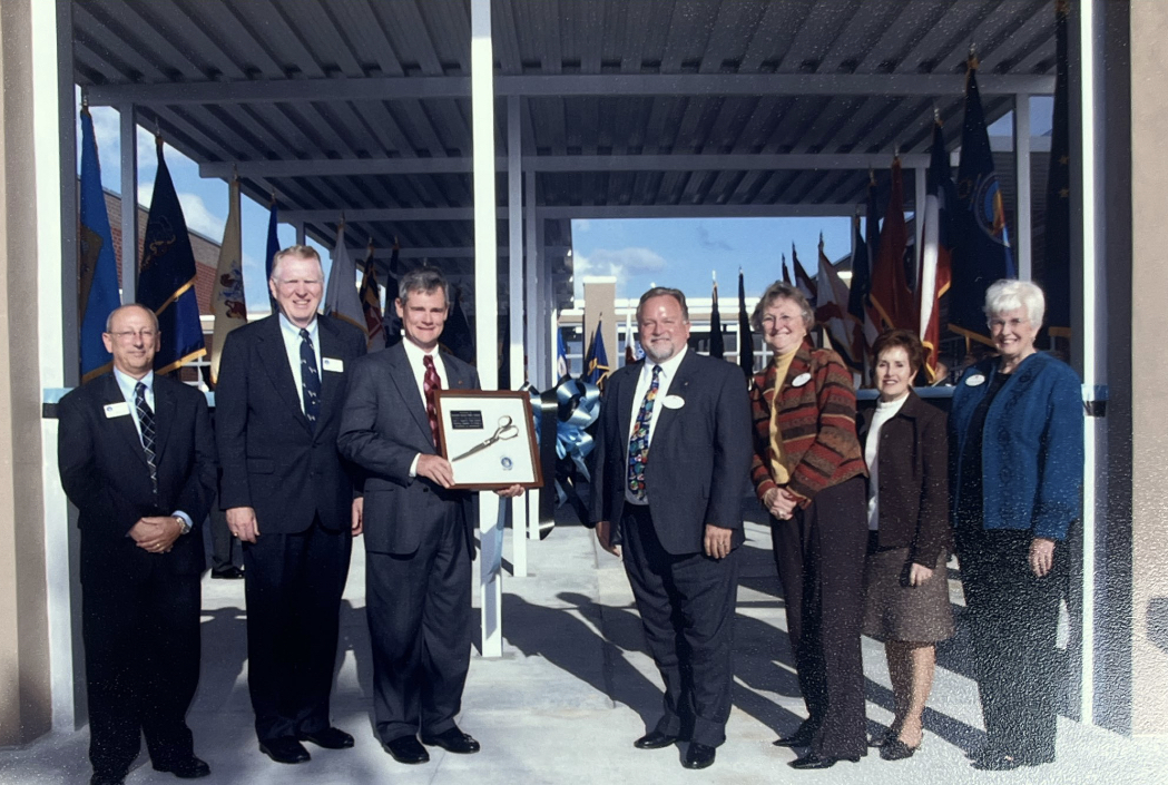 SCPS Administration and inaugural members of Hagerty stand in front of the entrance after the ribbon cutting ceremony. At this time, only half of the campus now was constructed. 