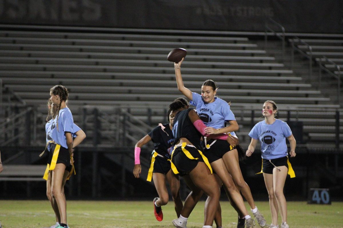 Junior Courtney Dusart gets tackled by senior Arianna Maboudou-Tchao. The senior defense kept the juniors from scoring all night.