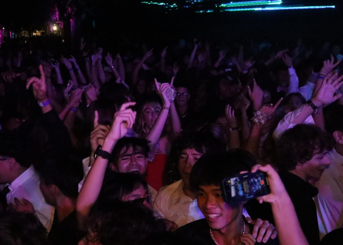 The crowd dances in the courtyard during Friday's homecoming dance. Over 1,000 students attended the event.