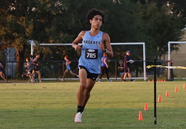 Senior Jacob Leon races to finish line. The team placed second overall.