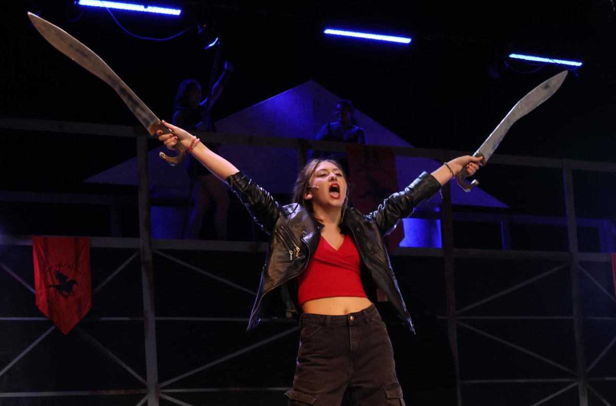 Senior Lana Carollo performs as Ares during the drama production of "Percy Jackson's The Lightning Thief" in October. Carollo was one of five Small Group members who earned a Superior rating and Top Honors at drama districts last weekend.