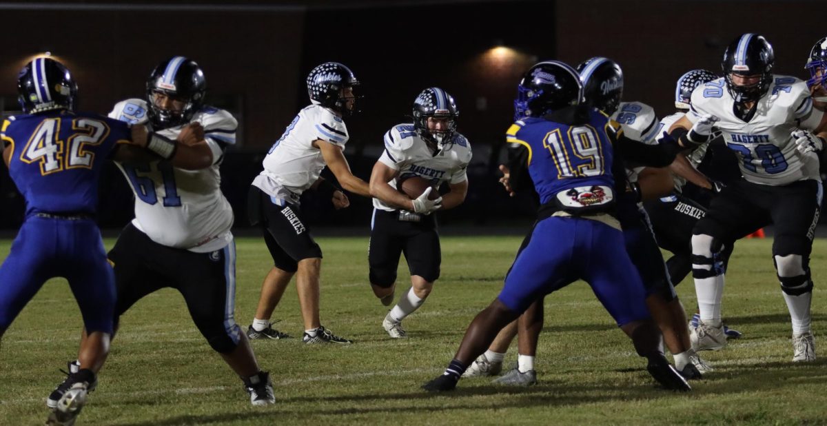 Senior running back Porter Williams runs the ball against the Lyman defense. Williams scored a 20-yard rushing touchdown in the third quarter to tie the game.