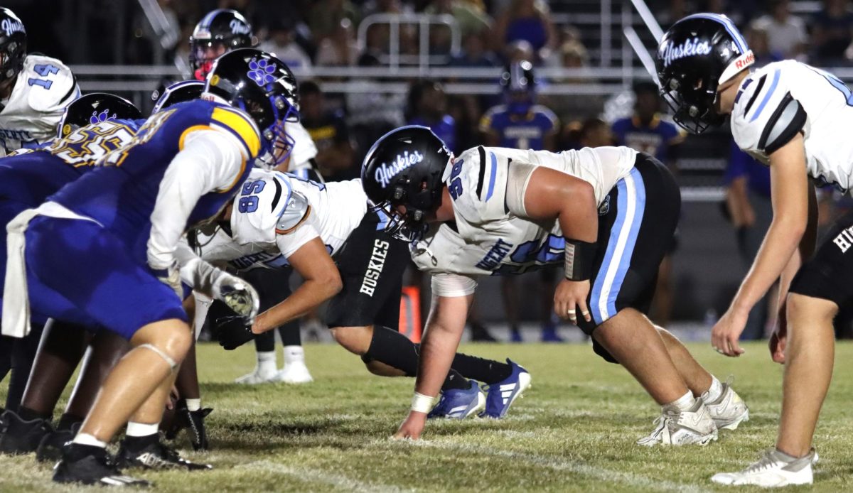 Trevor Covelli lines up on the defensive line in the game against Lyman. The team held Lyman to one score in the second half, but it was enough to win the game, 21-14.