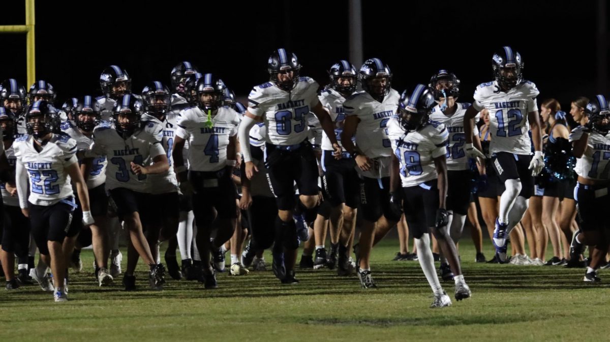 The team runs out on the field before the game against Lyman on Friday, Nov. 1. Lyman beat Hagerty, 21-14.