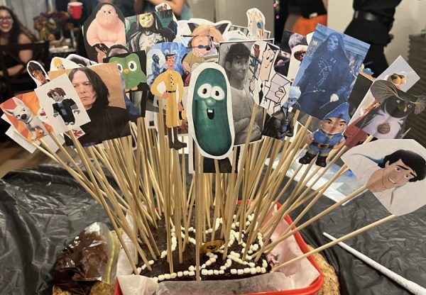 Senior Gabriella Navarro and her friends decorated their Hear Me Out cake with a collection of animated characters and actors. Hear Me Out cakes have recently become a growing trend on social media.