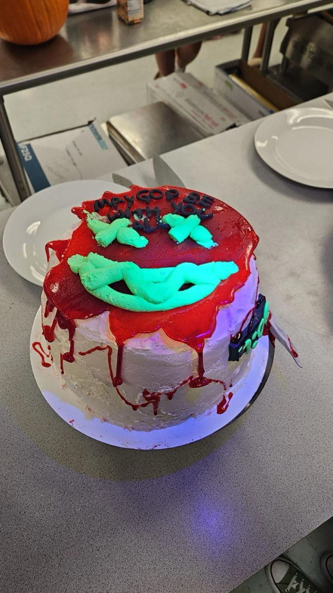 The Purge cake made in fourth period uses glow-in-the-dark powder and dripping frosting to bring the frightening masks to life.