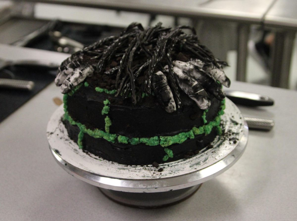 The Ring cake made in third period creatively uses colored frosting and licorice sticks to recreate the moss and strands of hair found on the undead main character.