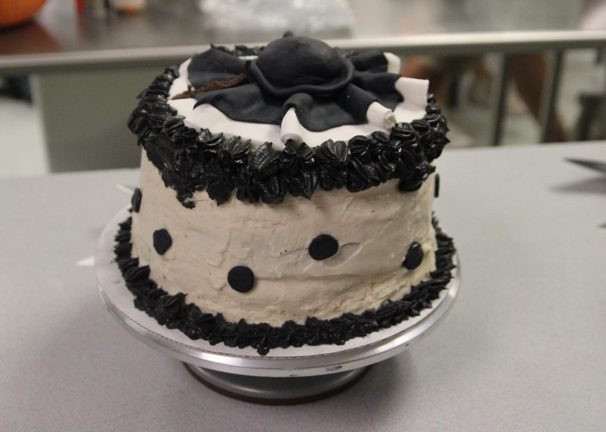 The Terrifier 3 cake made in third period uses ruffles, a ball cap and polka dots, all made out of fondant, to embody the Terrifier's clown suit.