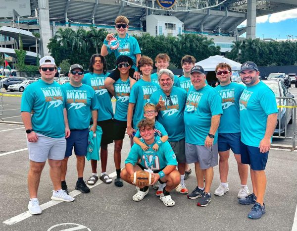 Junior Kyle Galarza attends the Miami Dolphins game with his friends and family.  He went to the game to celebrate his birthday.