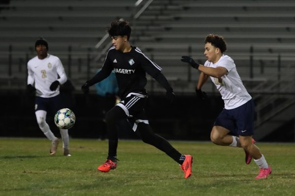 Varsity soccer beats University in district semifinals